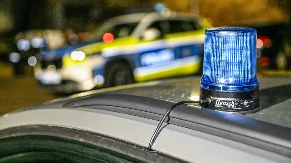 Two men caught in decommissioned police patrol car at vintage car meet