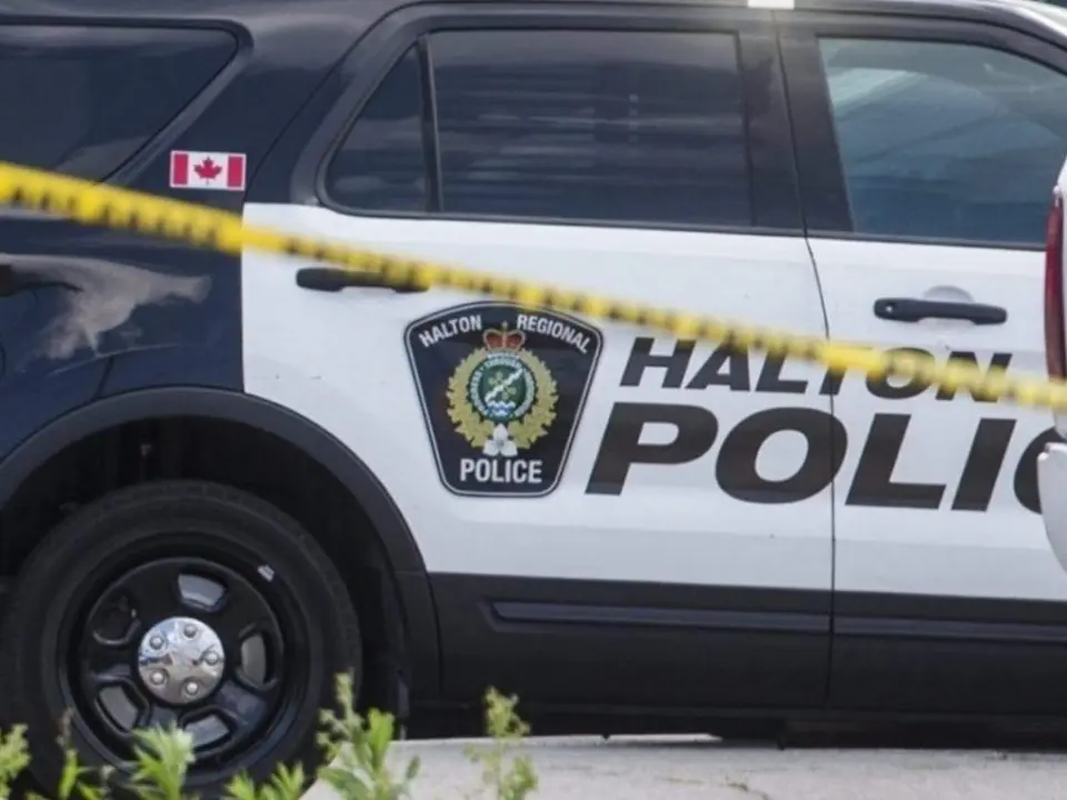 Ontario Resident Arrested with Loaded Firearms and Pills During Burlington Stop