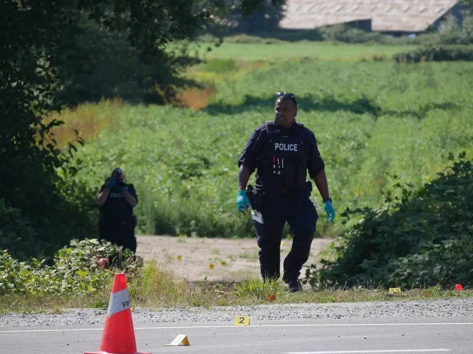 Woman's body found in Delta field after early morning fire on River Road
