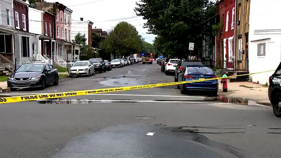 Three killed, 26 wounded in mass shootings in Trenton and Chicago minutes apart