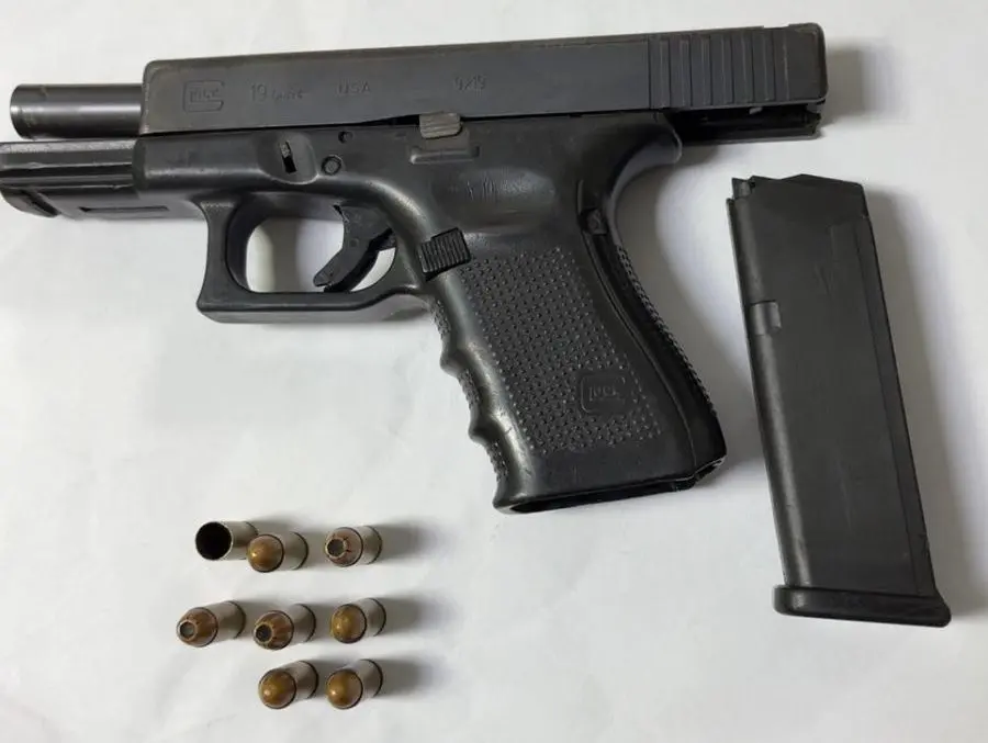 Unlicensed Glock 17 and ammo seized from security guard in Georgetown