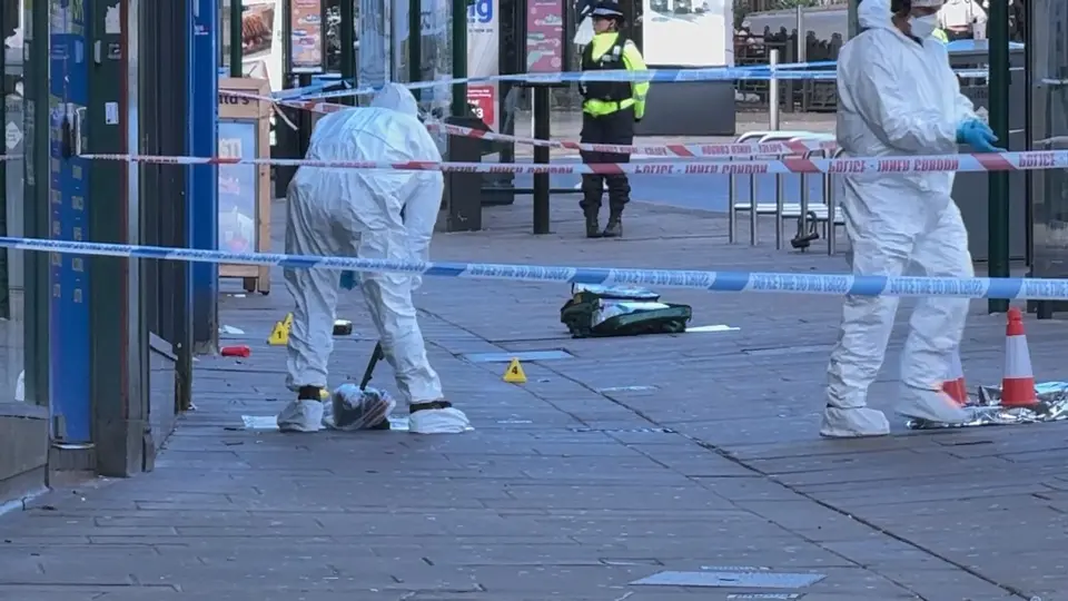 Police officer shot in Nottingham city centre, two suspects at large