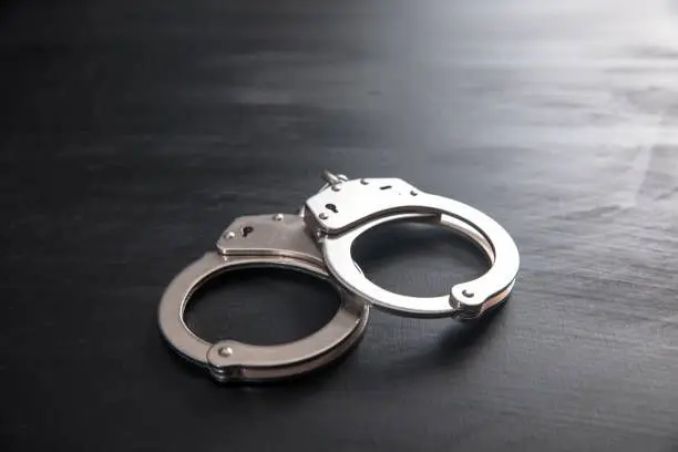 Weekend police raids in Trinidad yield arrests, weapons and narcotics