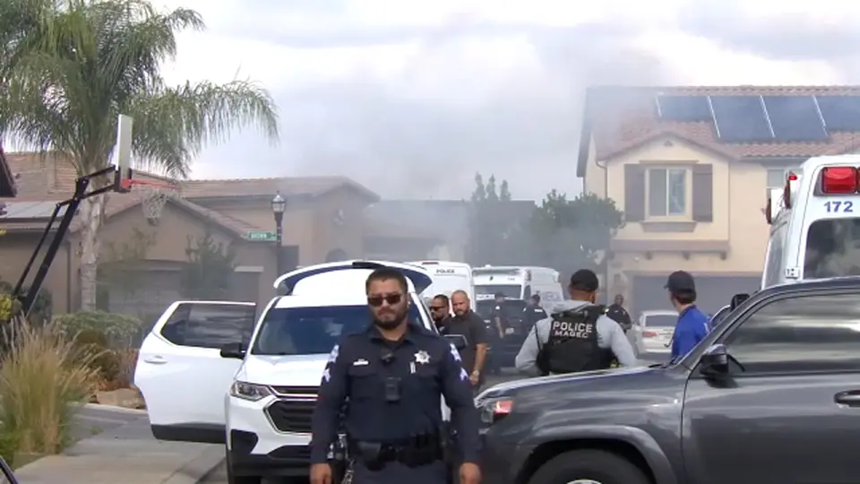 Domestic violence suspect arrested after standoff and trailer fire in Fresno