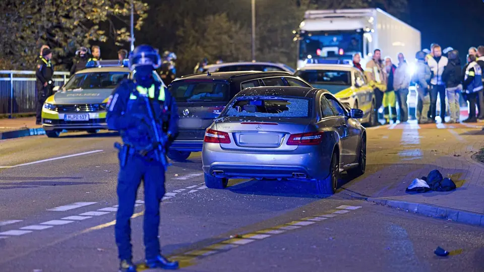 Car deliberately driven into crowd of people – police fire shots