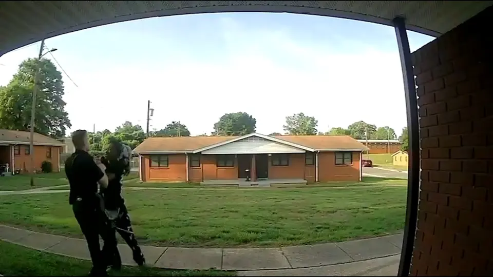 Former Shelby officer fired and charged after punching woman on doorbell camera