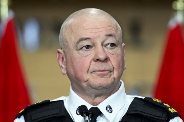 Toronto officer killed in raid linked to U.S. Consulate shooting, suspect charged