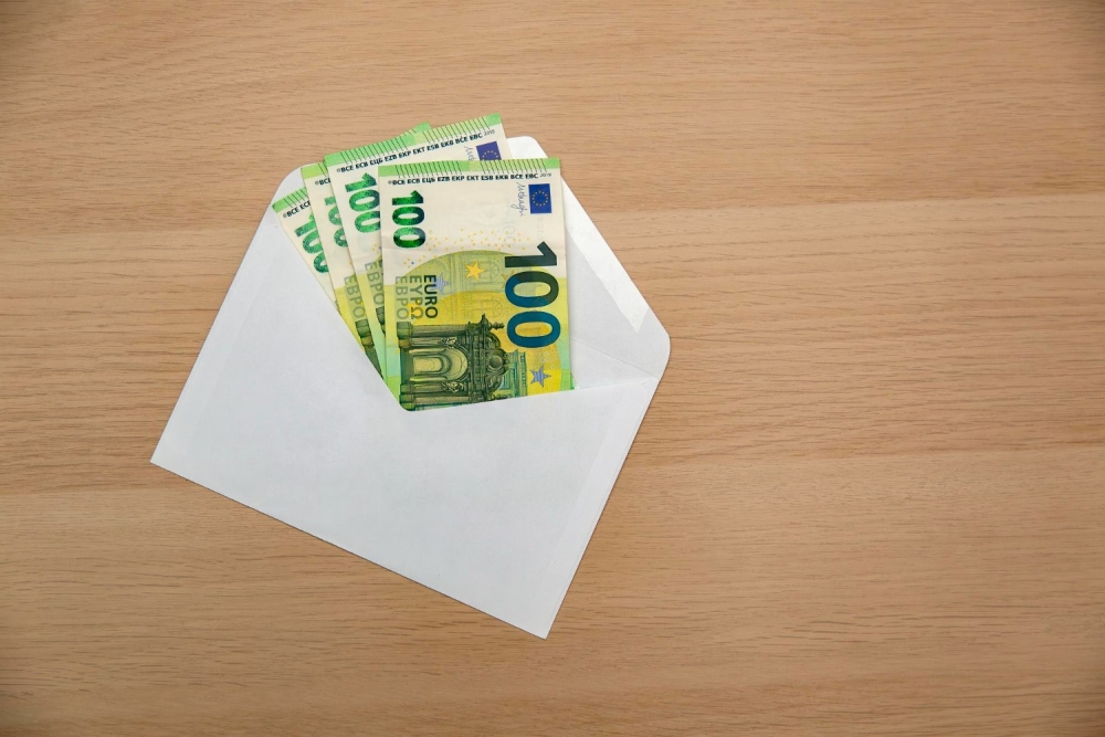 NMP aptur "aplokšņu" algu izmaksu Rīgas būvuzņēmumā — izņemti 12 270 eiro