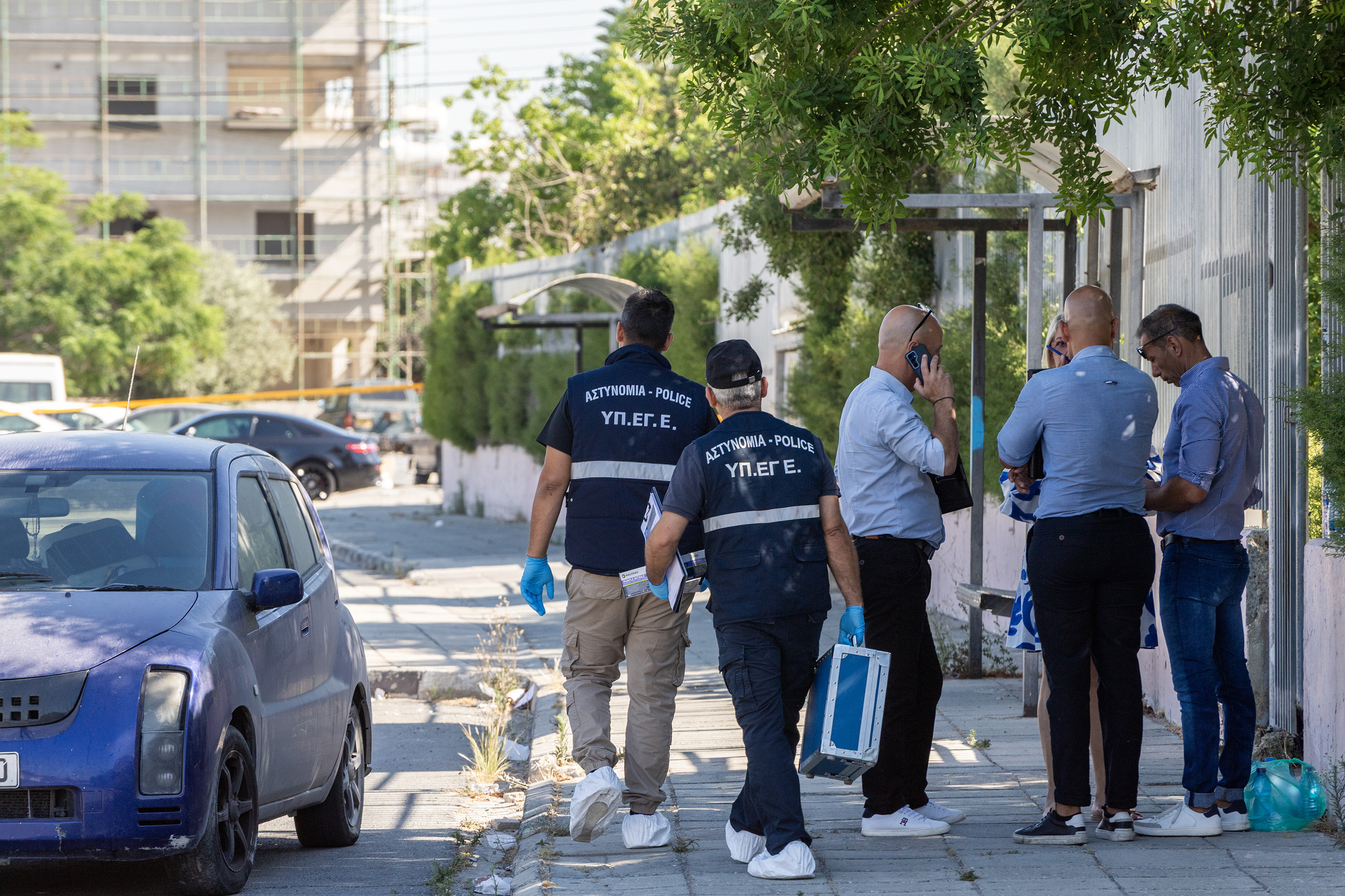 Cyprus police officer fatally shoots himself after wounding spouse; ex-husband sought in separate knife attack